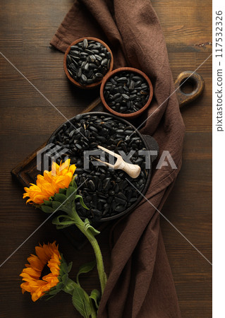 Sunflower seeds, tasty snack, concept of harvest Sunflower seeds, tasty snack, concept of harvest 117532326