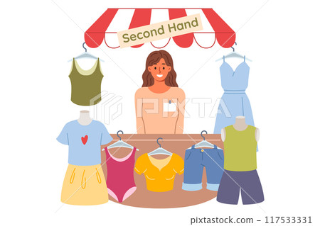 Woman selling second hand shop smiles and looks at screen, urging to buy cheap clothes 117533331