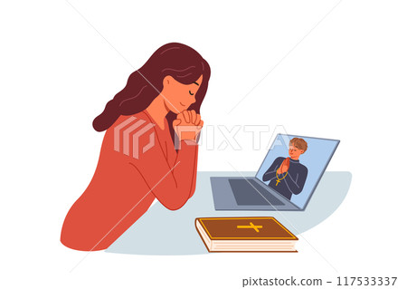 Woman prays sitting in front of laptop and watching video broadcast with priest from church Woman prays sitting in front of laptop and watching video broadcast with priest from church 117533337