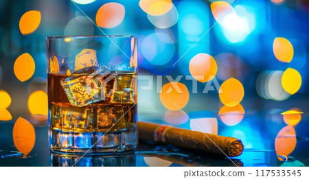 Glass of brandy and cuban cigar on an old wooden table. Angle view 117533545