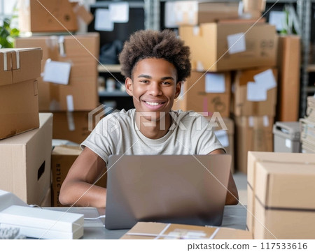 Online business. Young man business owner about online business. Successful and happy with the business 117533616
