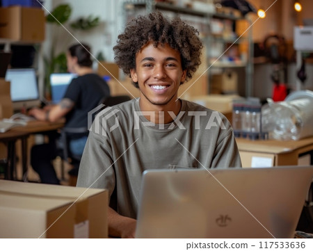 Online business. Young man business owner about online business. Successful and happy with the business Online business. Young man business owner about online business. Successful and happy with the business 117533636