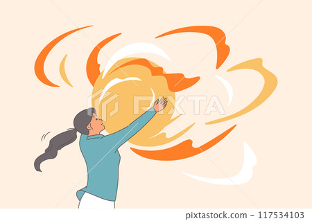 Woman inspired by big dream and inspiring goal, grabs glowing ball with hands, symbolizing chance 117534103