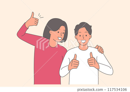 Happy couple shows thumbs up in agreement and hugs enjoying long-awaited meeting Happy couple shows thumbs up in agreement and hugs enjoying long-awaited meeting 117534106