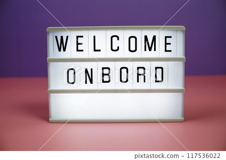 Welcome Onboard letterboard text on LED Lightbox on pink and purple background Welcome Onboard letterboard text on LED Lightbox on pink and purple background 117536022