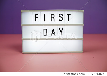 First Day letterboard text on LED Lightbox on pink and purple background First Day letterboard text on LED Lightbox on pink and purple background 117536024