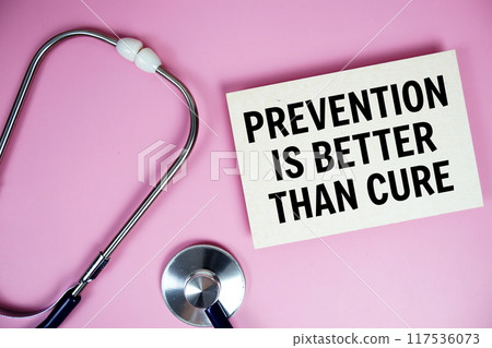 Prevention is better than cure text with stethoscope on pink background, Healthy and wellness concept 117536073