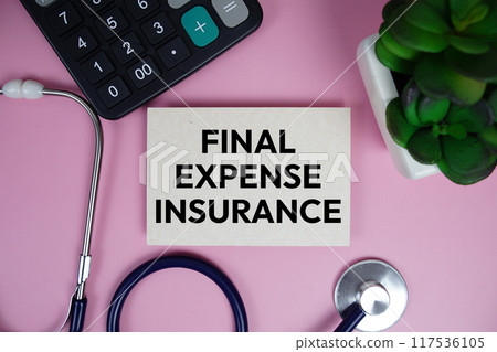 Final Expense Insurance text with calculator and stethoscope on blue background, Healthy and wellness concept 117536105