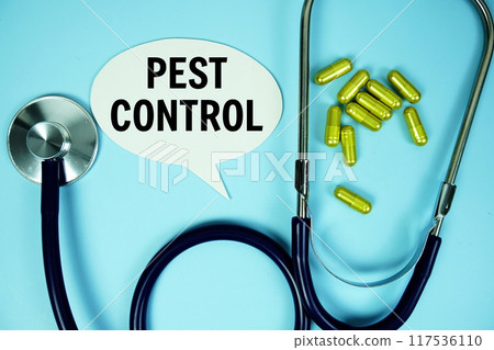 Pest Control text with stethoscope and capsule medicine on blue background, Healthy and wellness concept 117536110