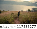 Each step is a dance with the wind in the golden sea of grass 117536277