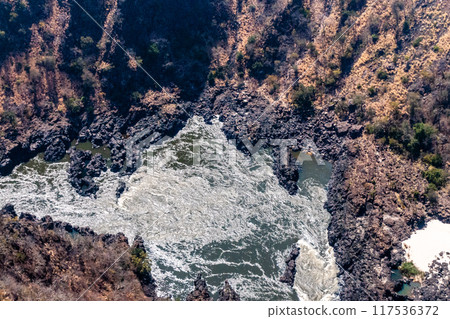 Aerial shot of the down stream gorges of the Zambezi river Aerial shot of the down stream gorges of the Zambezi river 117536372
