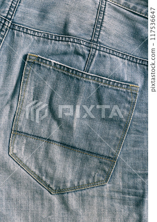 Old texture of Denim background. Vertical image Jeans vintage pattern. Old texture of Denim background. Vertical image Jeans vintage pattern. 117536647