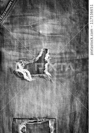 Old texture of Black Denim background. Vertical image Black Jeans vintage pattern. 117536651