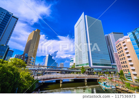 Yokohama cityscape in Japan: View of Benten Bridge, Ooka River, Yokohama City Hall, etc. from the pedestrian bridge in front of the new south exit of Sakuragicho Station (August 17th) Yokohama cityscape in Japan: View of Benten Bridge, Ooka River, Yokohama City Hall, etc. from the pedestrian bridge in front of the new south exit of Sakuragicho Station (August 17th) 117536973