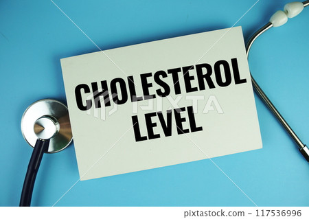 Cholesterol Level text message on speech bubble with Stethoscope  top view on blue background, Health concept background 117536996
