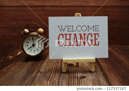 Welcome Change text on paper card on wooden background Welcome Change text on paper card on wooden background 117537187