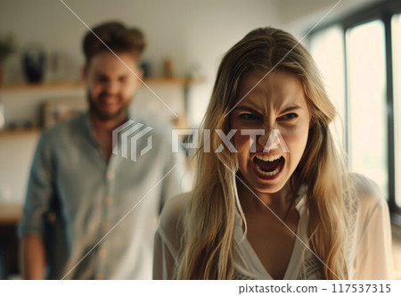 attractive angry couple fighting and shouting at each other 117537315