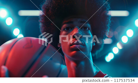 African american man with afro hair basketball player holding ball 117537534