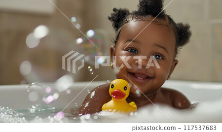 baby infant taking bath, looking upwards and playing 117537683