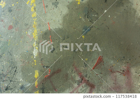 Dirty wall, spray graffitied concrete wall, splattered paint, sprayed spray 117538418