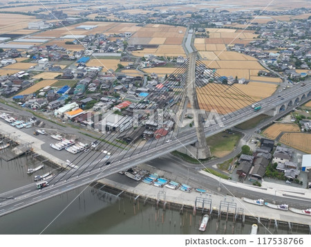 Aerial view of the Yabegawa Bridge and surrounding area on the Ariake Sea coastal road Aerial view of the Yabegawa Bridge and surrounding area on the Ariake Sea coastal road 117538766