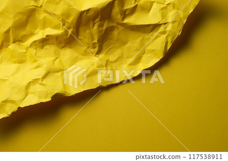 Crumpled yellow paper background material Crumpled yellow paper background material 117538911