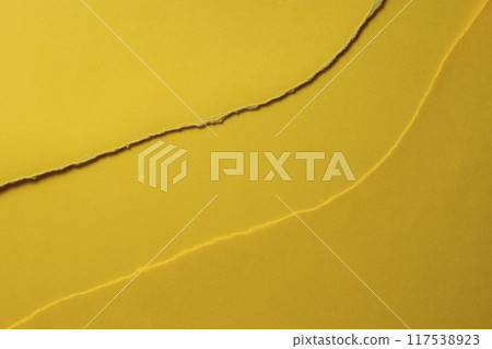 Torn yellow paper background material Torn yellow paper background material 117538923