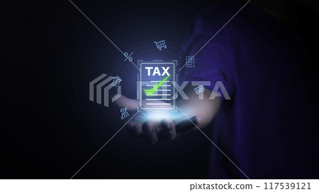 income tax. Businessman pointing to tax icon. income tax system icon around. pay online income tax. futuristic virtual screen interface technology.Money saving ideas in the age of virtual technology.. 117539121