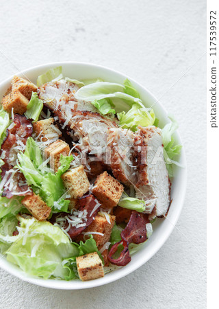A bowl of Caesar salad A bowl of Caesar salad 117539572