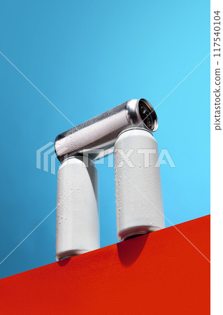 Set of white cans on against blue background. Mockup. Beer, lemonade, energy drinks, cocktails, soda water. Set of white cans on against blue background. Mockup. Beer, lemonade, energy drinks, cocktails, soda water. 117540104