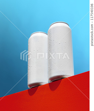 Set of white cans on against blue background. Mockup. Beer, lemonade, energy drinks, cocktails, soda water. Set of white cans on against blue background. Mockup. Beer, lemonade, energy drinks, cocktails, soda water. 117540106