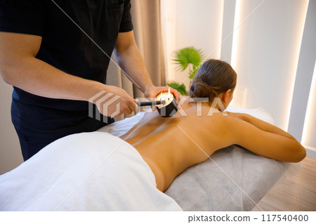 Soothing Wax Massage Session with Candles Soothing Wax Massage Session with Candles 117540400