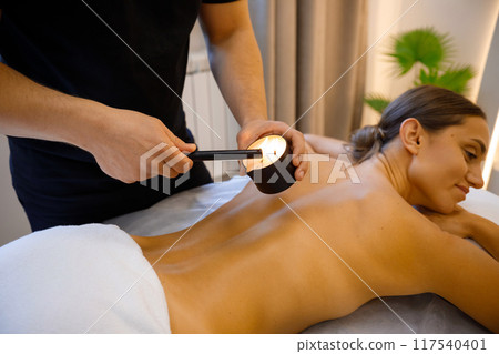 Therapeutic Wax Massage by Candle Glow 117540401