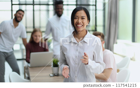 young successful businesswoman in white shirt smiling young successful businesswoman in white shirt smiling 117541215