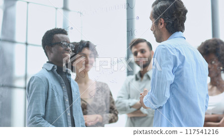 Young, motivated and experienced employees are brainstorming in the conference room. Young, motivated and experienced employees are brainstorming in the conference room. 117541216
