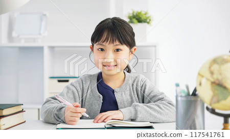 Girl studying Girl studying 117541761