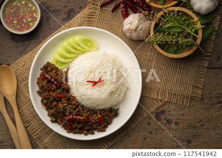 Cooked rice and Thai Basil Minced beef,Stir fired ground beef with garlic and basil leaf in chilli sauce (Pad Kra pao).Top view 117541942