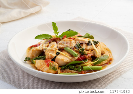 Spicy Stir Fried Chicken breast with chili and fingerroot in white plate.(Pad Cha) Spicy Stir Fried Chicken breast with chili and fingerroot in white plate.(Pad Cha) 117541983