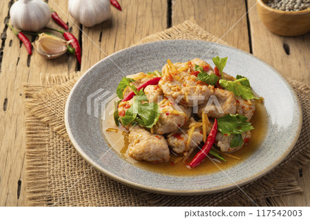 Stir Fried Spicy Fish Balls, Spicy stir fry clown featherback fishball in a plate 117542003