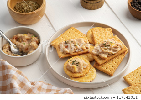 Butter cracker with tuna salad on a plate,snack food Butter cracker with tuna salad on a plate,snack food 117542011