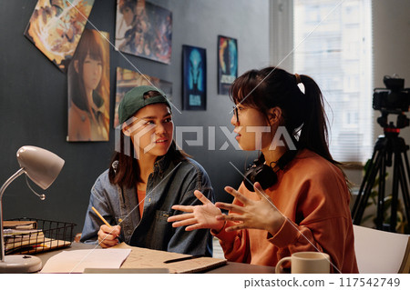 Discussing Creative Ideas During Collaborative Meeting Discussing Creative Ideas During Collaborative Meeting 117542749