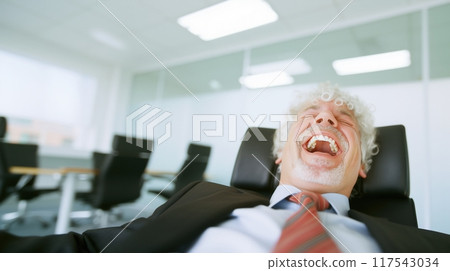 Businessman laughing with his mouth wide open 117543034