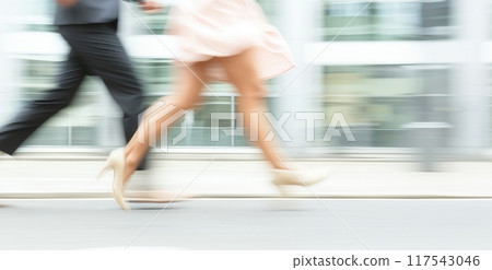 The feet of a company employee walking hurriedly The feet of a company employee walking hurriedly 117543046