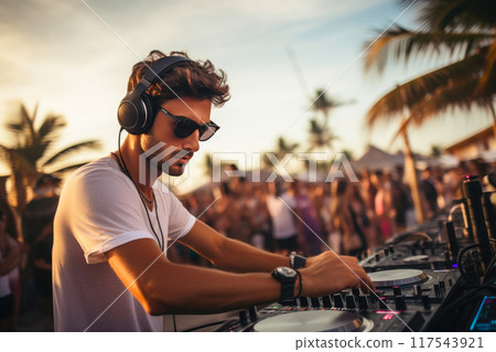 Energetic Beach Night: DJ Blends Tunes Amidst Crowd Energetic Beach Night: DJ Blends Tunes Amidst Crowd 117543921