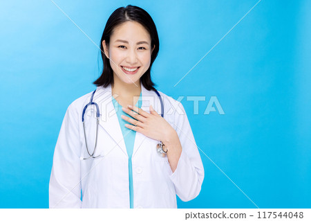 Young female doctor white coat 117544048