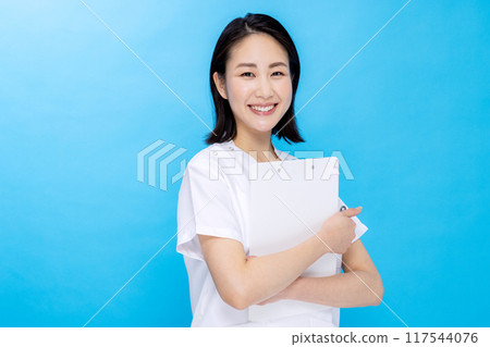 Young woman in a nurse color back 117544076
