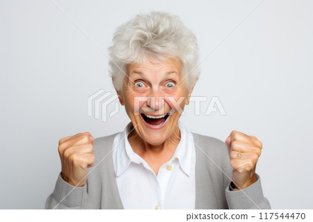 Whimsical Senior Female Embraces Success with Humor Whimsical Senior Female Embraces Success with Humor 117544470