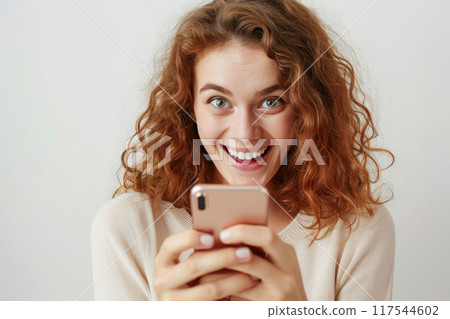Digital Connection: Smiling Woman with Smartphone 117544602