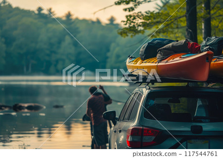 Kayak Adventure Begins: Lakeside Unloading Kayak Adventure Begins: Lakeside Unloading 117544761