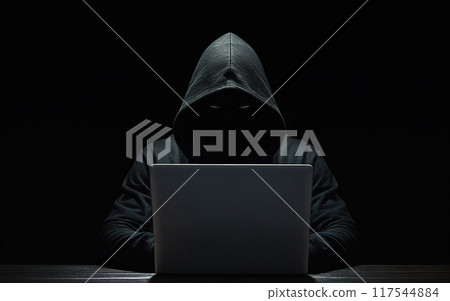hacker, scammer, in a hoodie with his face covered in shadow, working with a laptop, cybersecurity 117544884